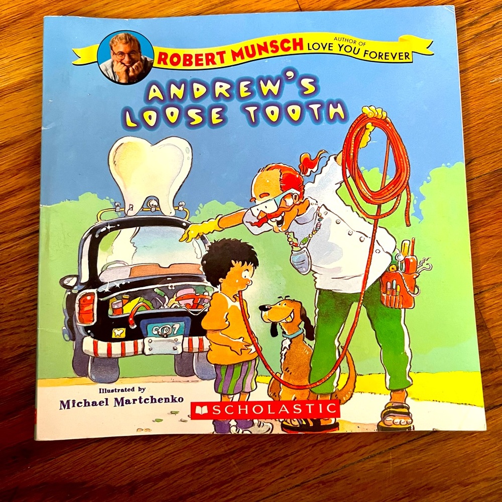“Andrew’s Loose Tooth.”  Paperback. Like new.